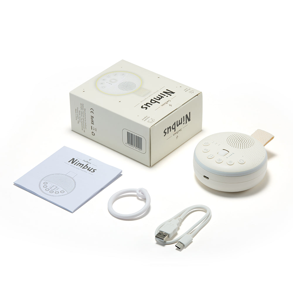 White 'Nimbus' device with packaging, USB cable, and user manual on a white background